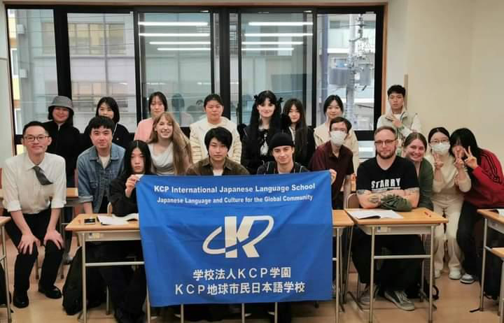 This image was taken in the KCP classroom. See Saito sensei on the far left, I’m the blonde one person over from him.
